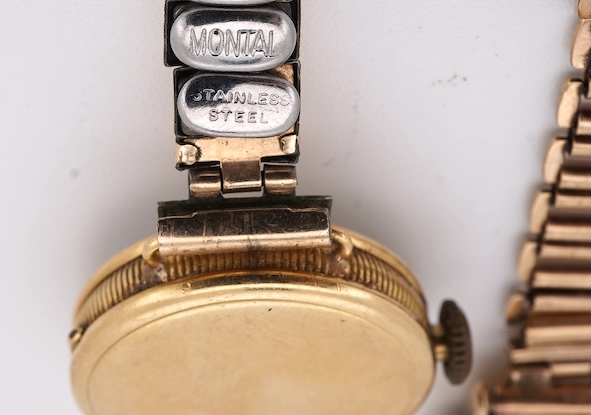 A lady's 1950's 9ct gold Tudor manual wind wrist watch, with Arabic dial, case diameter 18mm, on a damaged 9ct gold bracelet, gross weight 18.6 grams, together with a lady's 18ct gold Buren manual wind wrist watch, on a